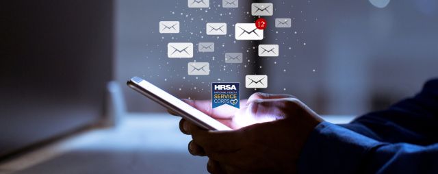 An illuminated phone with email icons and the NHSC logo floating above it.